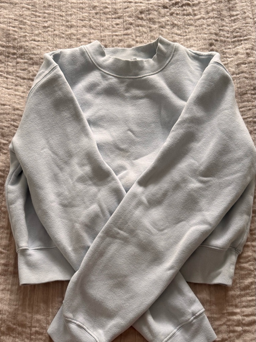 TNA CozyAF Cropped Fleece Sweatshirt in Light Blue
